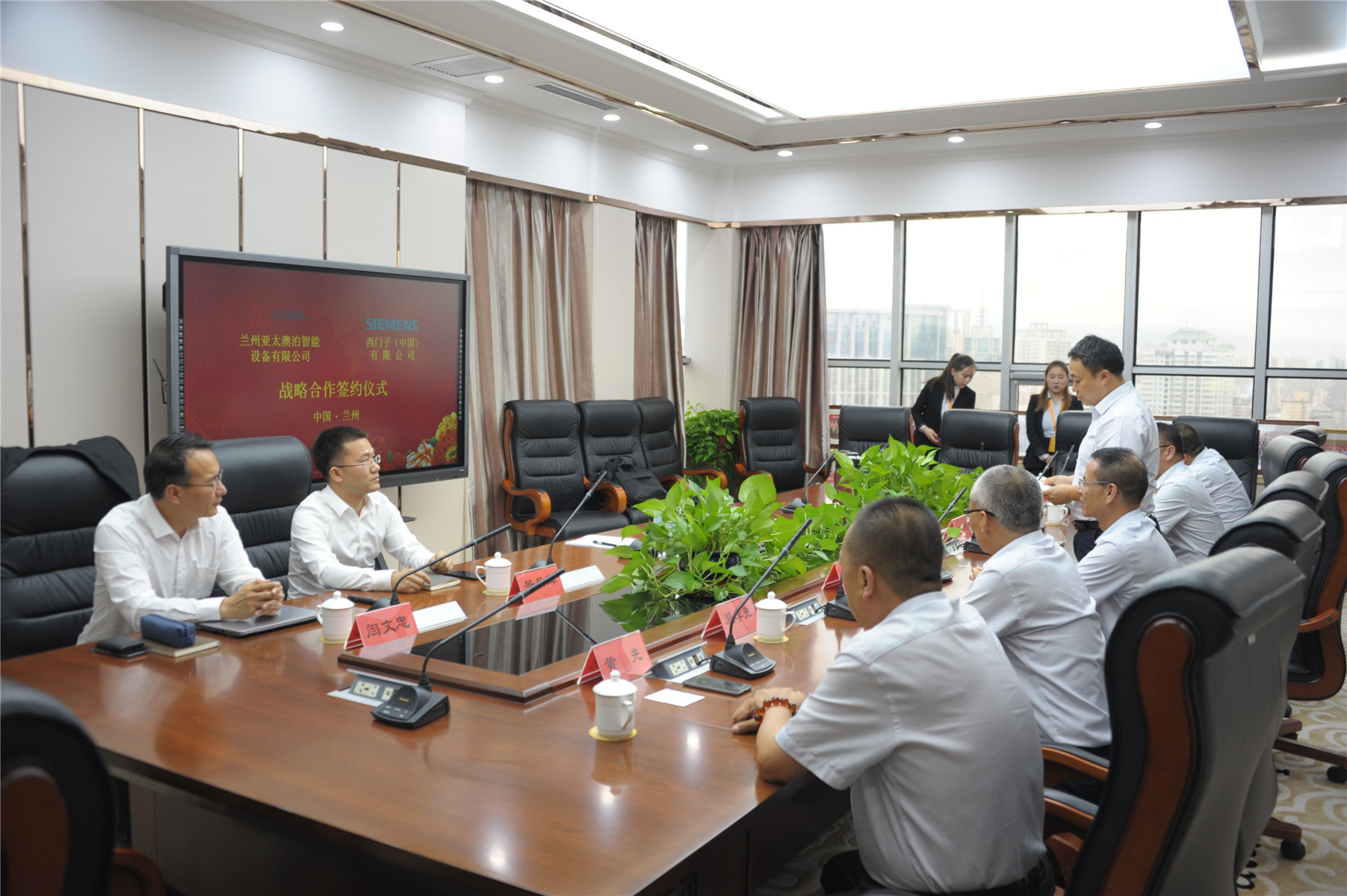 兰州“必一运动澳泊智能车库”与西门子（中国）公司签署战略相助协议
